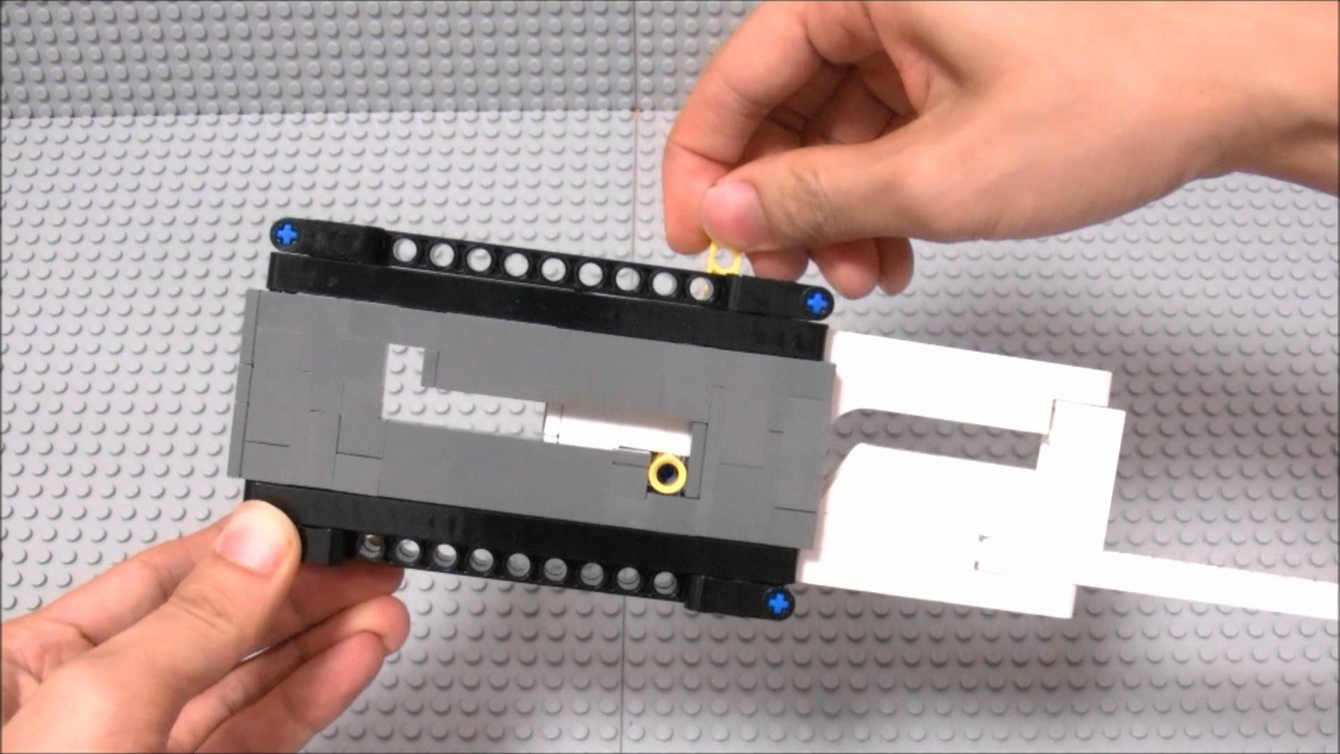 LEGO Intermittent motion using grooved cam